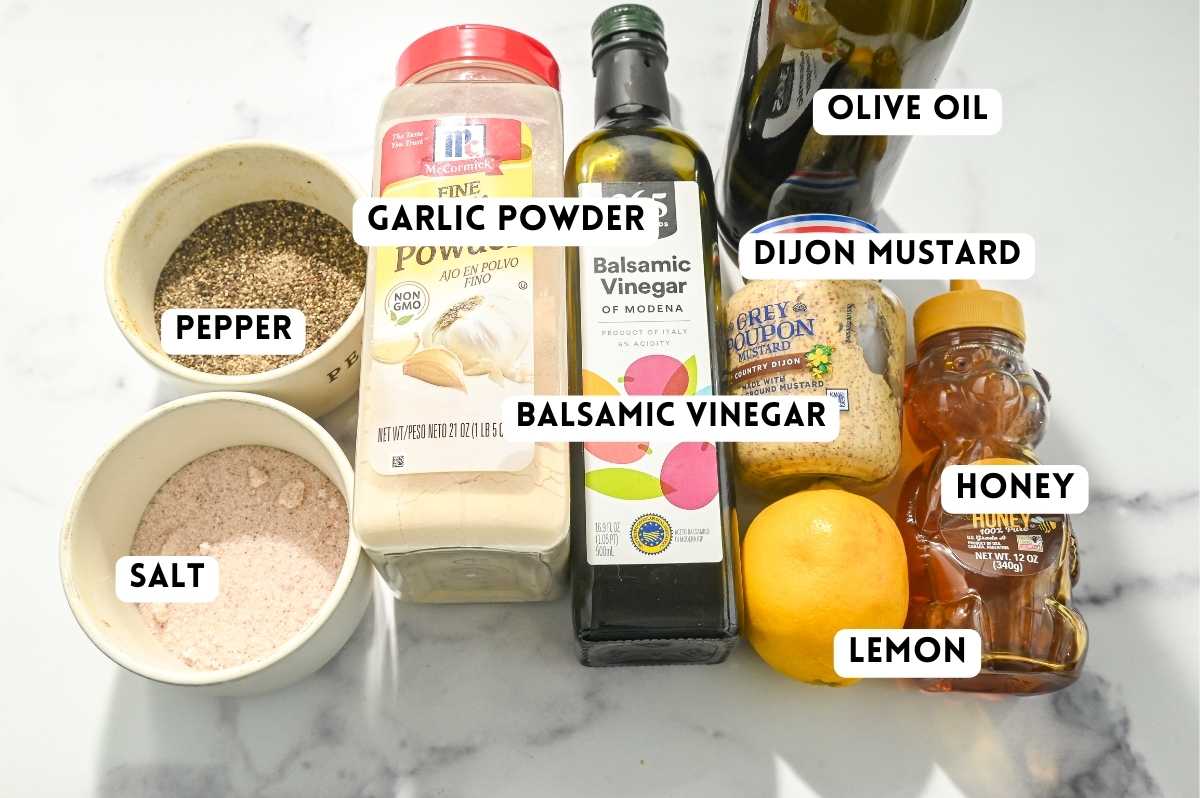 labeled ingredients for making balsamic lemon vinaigrette.